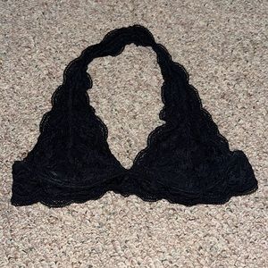 Black lace bra size M with hooks connecting the bra together.